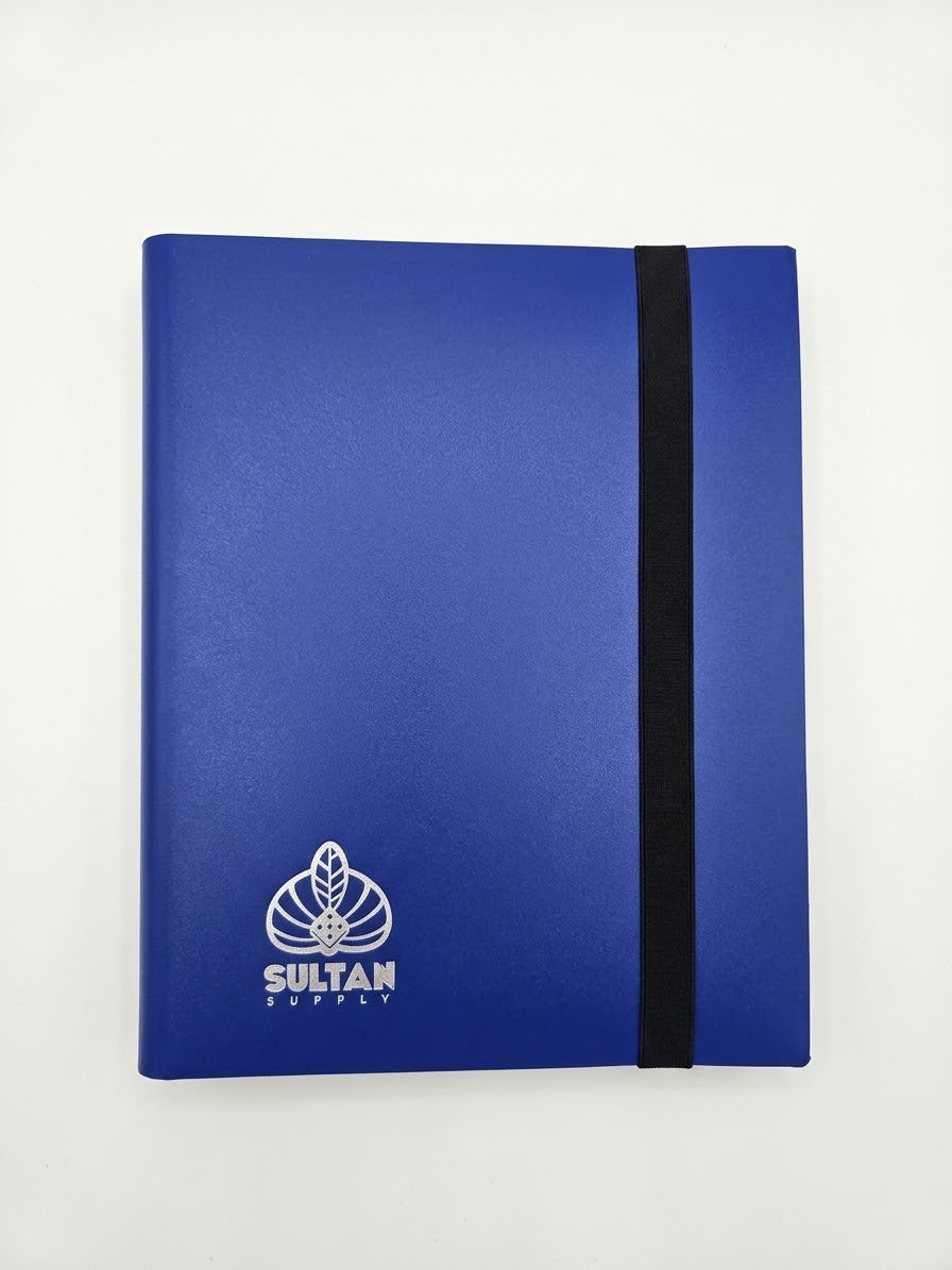 Front view of blue Sultan Supply 360-card trading card binder featuring a white brand logo and black elastic closure.

Back view of Sultan Supply blue trading card binder showing a solid blue exterior and black elastic strap.

Interior view of Sultan Supply 360-card binder displaying black-backed 9-pocket trading card storage pages.