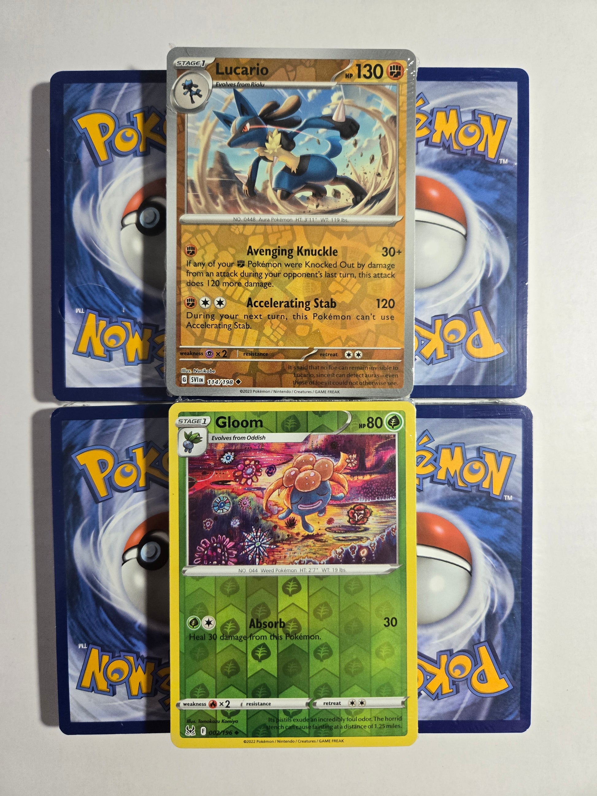 Curated Pokémon Card Bundle — 23 Authentic Cards, No Duplicates, 2+ Holos & 1 Rare Guaranteed - Moonlight Collectibles product image