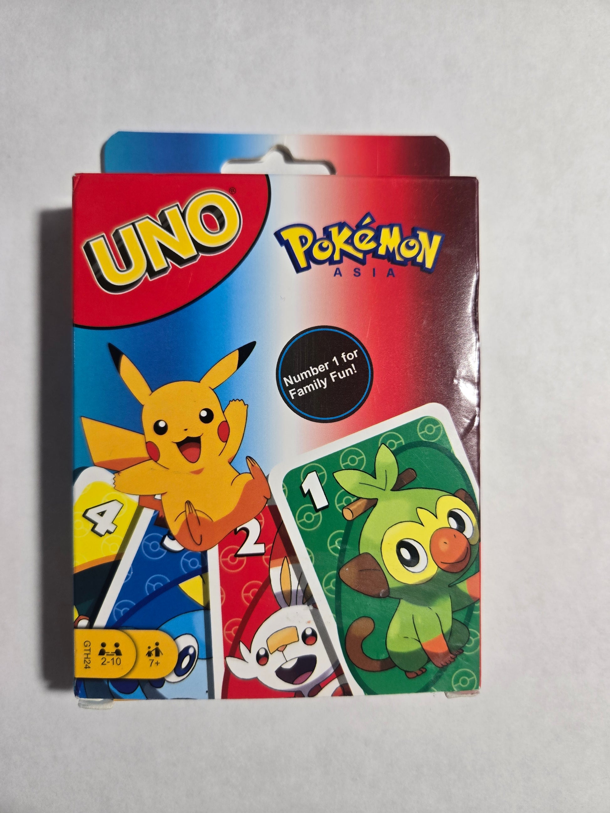 Pokémon Asia UNO-style matching card game package featuring Pikachu Grookey and Scorbunny