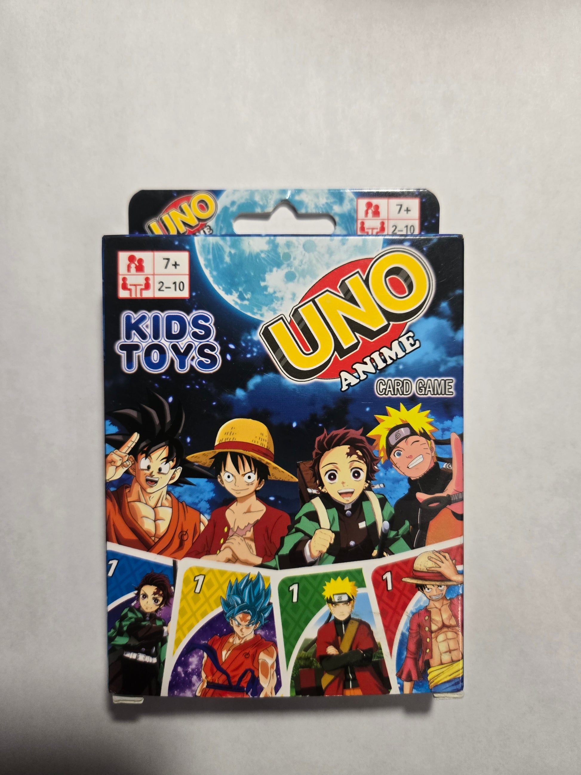 Anime-themed UNO-style matching card game package featuring One Piece Naruto Dragon Ball and Demon Slayer characters